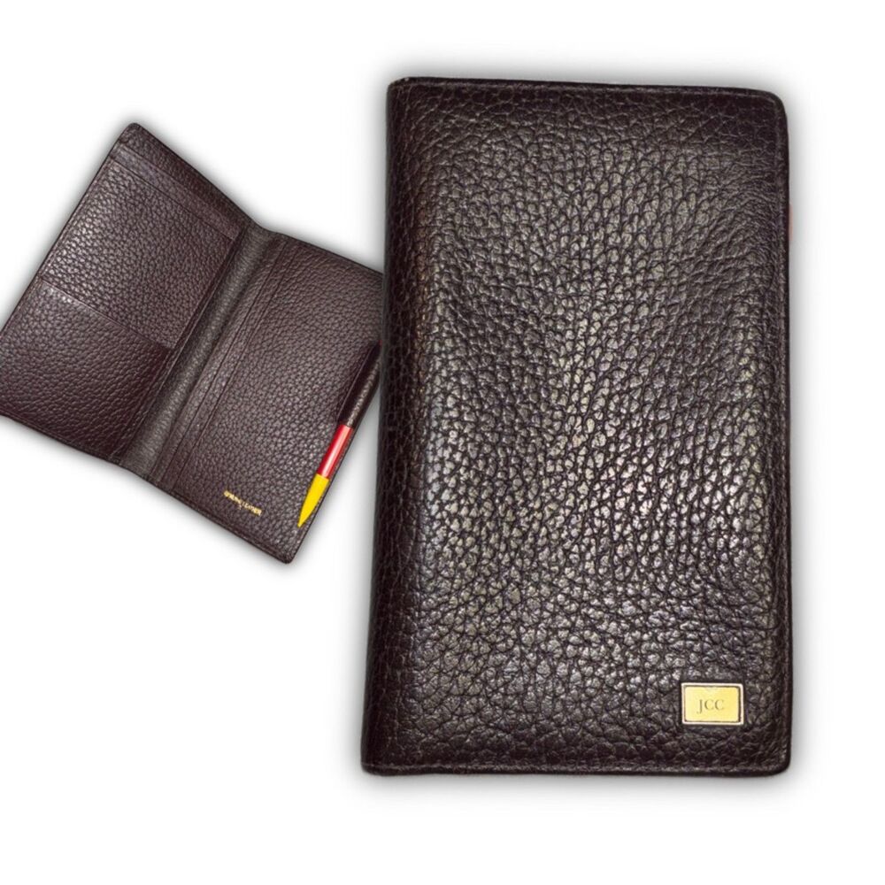 JCC purple leather planner booklet.